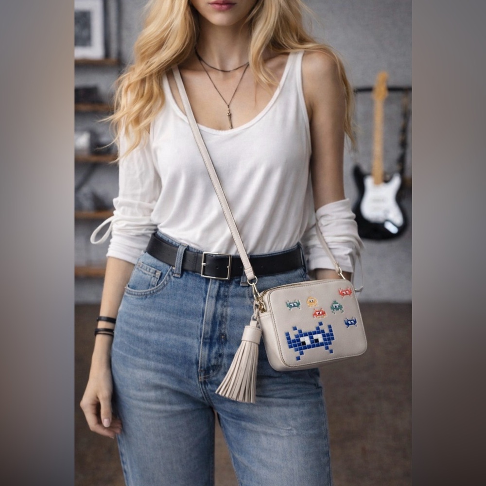 Anya Hindmarch Space Invader cross body bag.